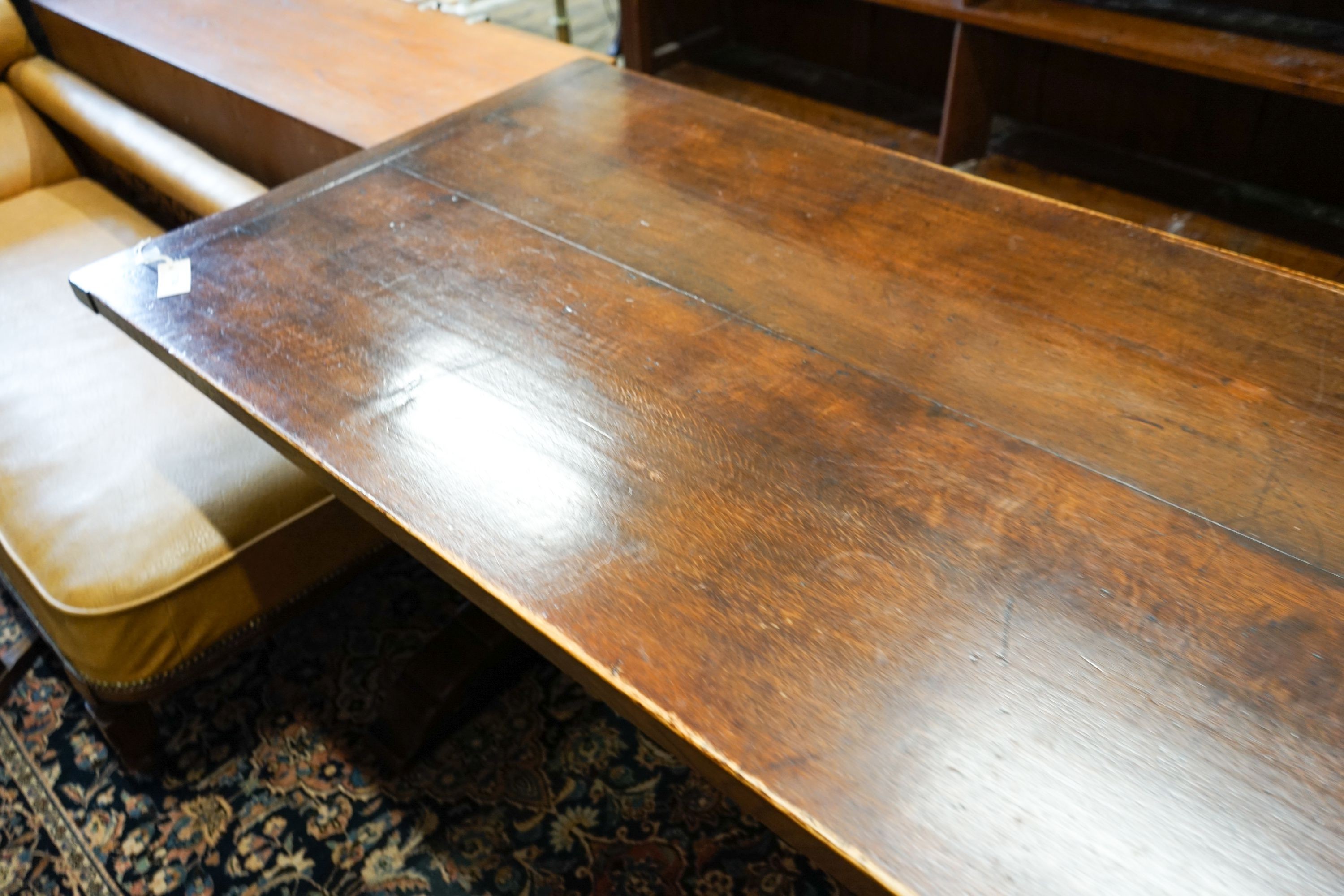 A 17th century style carved rectangular oak refectory table